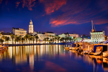 Split, Croatia. View of Split - the second largest city of Croatia at night. Shore of the Adriatic Sea and famous Palace of the Emperor Diocletian. Traveling concept. Mediterranean countries.