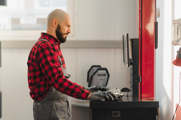 working process of a full system diagnostic scanner that can quickly test every system module s status and make faster diagnosis. mechanic makes computer diagnostics of the car