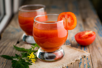 two glasses of freshly squeezed tomato juice