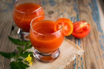two glasses of freshly squeezed tomato juice