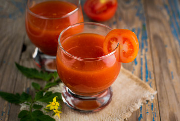 two glasses of freshly squeezed tomato juice
