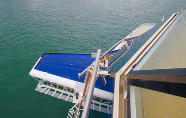 Birdseye view over navigational bridge of modern cruise ship liner or cruiseship in port onto the...