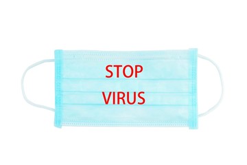 Protective medical mask on a white background with the words STOP VIRUS. Protection against virus infection.