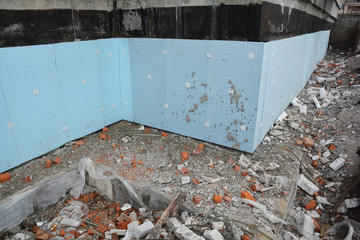 Expanded Polystyrene (EPS) foam board house foundation wall insulation.  House foundation...