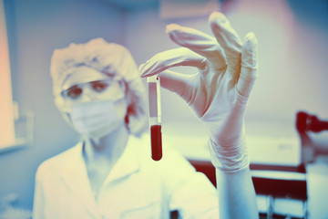 medical test tubes with blood tests on a laboratory background.2019-nCoV; coronavirus; China;