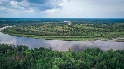 Fototapeta na wymiar Aerial view Pripyat river in the resettlement zone in the Polessky Radiological Reserve. Ecological problem concept.