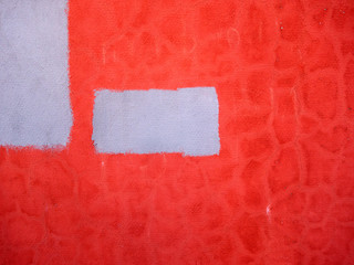 red gray two-color weathered wall