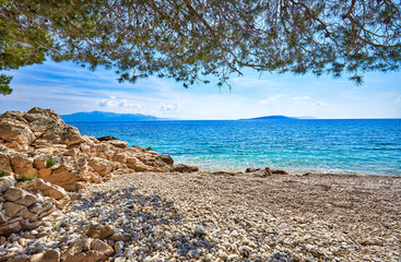 Amazing seascape of Adriatic sea. Luchica beach Croatia, Europe. Colorful summer view of small beach. Croatian coast with clear water and pine trees around. Tropical viewpoint for design postcard.