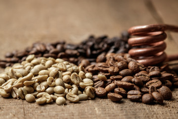  Different types of coffee beans of different roasting. The aroma of coffee, a spiral, selected beans, arabica coffee, energy, relaxation, pleasure.