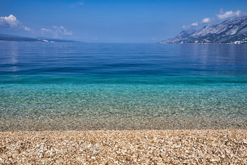 Amazing seascape of Adriatic sea. Colorful summer view of small Brela beach Croatia, Europe....