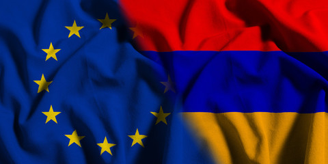 National flag of Armenia with European Union (EU) flag on a waving cotton texture background