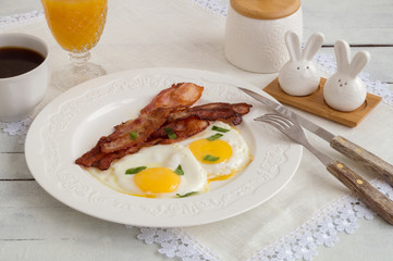fried eggs with bacon. Sunny side up egg
