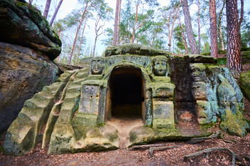 Rock sculptures of giant heads and other artworks Harfenice (Harfenist) carved into the sandstone...