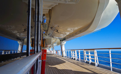 Blue Hour on empty deck with railing and panoramic ocean view on cruiseship or cruise ship liner...