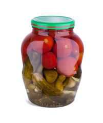 A glass jar of tasties canned tomatoes and cucumbers on white background
