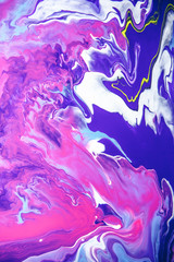 Acrylic paint liquid in trend purple and blue color mix background.