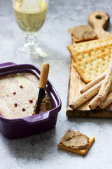 Chicken liver, onion and carrot paste, served with crackers, grissini and champagne.
