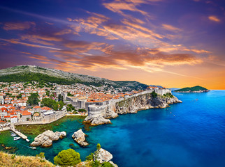 Aerial view at famous european travel destination in Croatia, Dubrovnik old town, Dalmatia, Europe. UNESCO list. Fort Bokar seen from south old walls on a sunny day in dramatic light.. - obrazy, fototapety, plakaty
