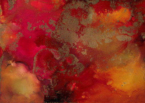 orange, red and gold alcohol ink splatter background