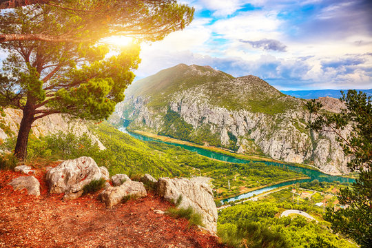Beautiful aerial panoramic view of Cetina river canyon and mouth in Omi