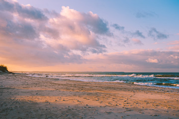 Fototapeta na wymiar Sunset Deserted beach of the Baltic Sea