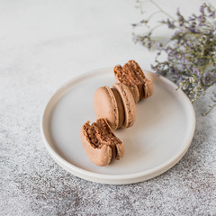 Three macaroons on a plate