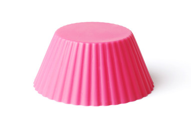 silicone mold for baking on a white background. Culinary accessories of the baker. Small baking cups. It is isolated.