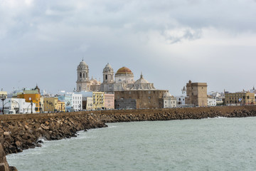 Promenade and Cathedral of Santa Cruz in Cadiz, Spain.