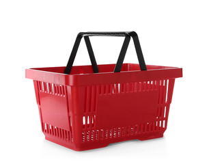 Color plastic shopping basket isolated on white