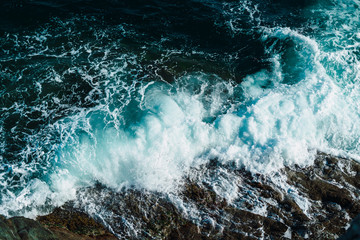 Sea ​​waves breaking against the rocks