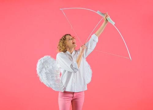 Arrow of love. Cupid shoot love arrow with bow for valentine day. Female angel with bow and arrow. Cupid in valentine day. Valentines day cupid. Cupid angel with bow and arrow. Valentines Day concept.