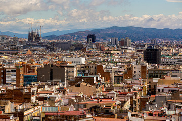 Obraz premium barcelona spain landscape city view sagrada familia church all city sunset 