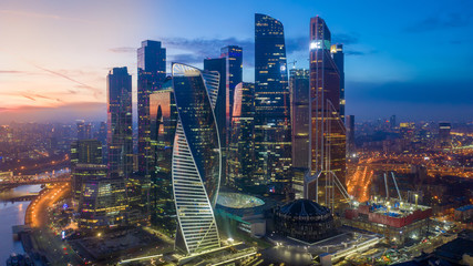 Moscow city sunset aerial view from drone with scyscrappers, business centre and ambankment