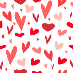 Pink vector hearts on a white background.Vector seamless pattern.Can be used for textiles,wrapping paper,wedding cards,design elements for cards,invitations,websites and wallpapers.Valentine's Day.