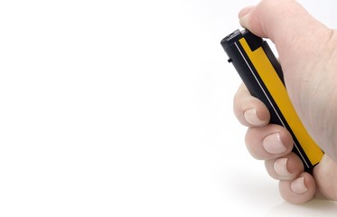 Gas lighter in hand isolated on a white background