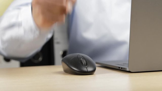Angry adult man checking laptop online content in a office