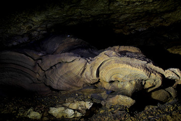 Traces of flooding on cave wall ornaments in karst area of Gunungsewu. Karst region has underground rivers with huge potential for water resources.