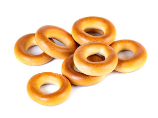 Small dry bagels, small rolls on a white background