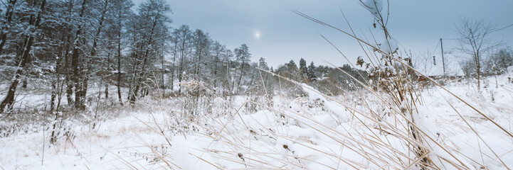 Blue sky with snow field. Great background with copyspace. Winter and snow landscape. Stock photo.