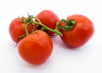 fresh tomatoes isolated on white background