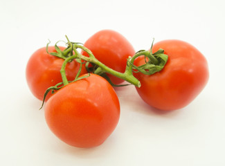 fresh tomatoes isolated on white background