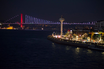 Fototapeta na wymiar Bosphorus bridge in the night with the lights on, Istanbul