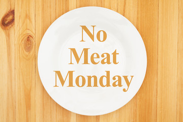 No meat Monday message on white empty plate