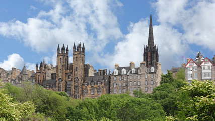 Fototapeta na wymiar Cityscape of Edinburgh with New College and spire of former Tolbooth Kirk