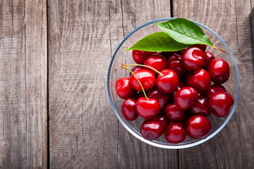 sweet cherry on wooden background