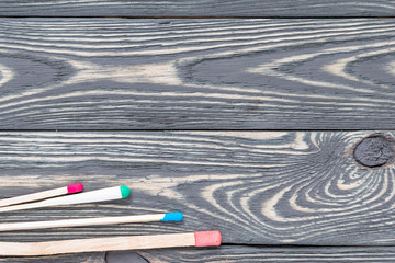 Multicolored matches on a decorative background