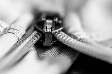 close up photo of a zipper on a sweatshirt