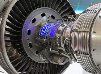 Plane engine element. Turbine blades. Blue light