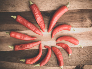 Decoration of chili peppers on wodden board. Set