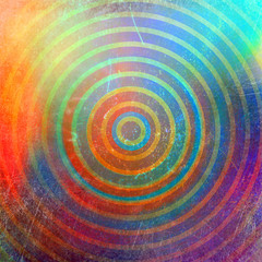 Abstract colorful circles background with grunge effects and vibrant & vivid colors. Vintage style old fashioned shiny lights background, wall paper.